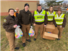 Kent County Sheriff Cadets distributing eggs in park
