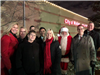 People standing with Santa
