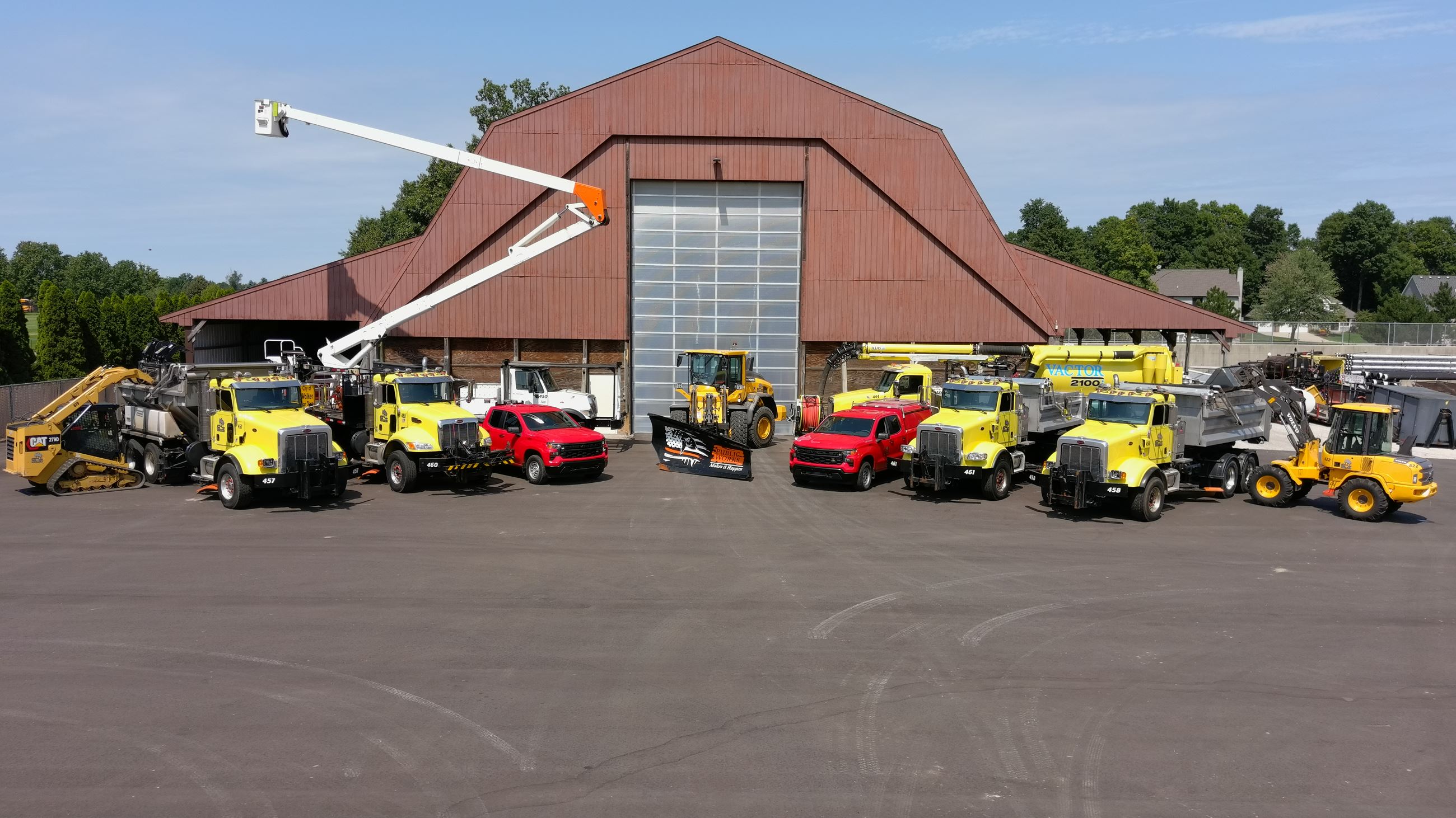 A loader filling a dump truck with salt.