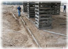 Workmen under the house